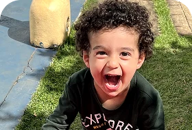 Criança sorrindo no parque da escola, Escola Infantil em Santo André